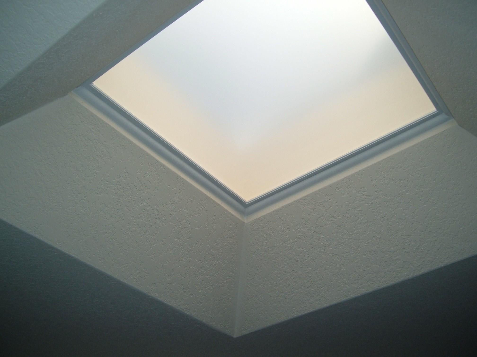 Window film installed on a skylight for heat and glare control